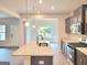 Well-equipped kitchen with granite counters, stainless appliances, and island at 4849 Walkers Green, Mableton, GA 30126