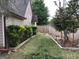 Cozy backyard with a privacy fence, perfect for outdoor relaxation and entertaining at 3221 Rock Creek Dr, Rex, GA 30273