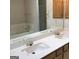 Bright bathroom featuring a double sink vanity, bathtub, and storage at 3221 Rock Creek Dr, Rex, GA 30273