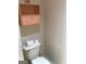 Small bathroom featuring wallpaper, toilet, and storage at 3221 Rock Creek Dr, Rex, GA 30273