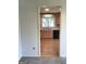 Kitchen view featuring wood floors, stainless steel sink, and natural wood cabinets at 3221 Rock Creek Dr, Rex, GA 30273