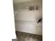 Walk-in closet featuring neutral walls, carpet, and metal shelving at 3221 Rock Creek Dr, Rex, GA 30273