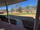 Covered front porch with view of the well-maintained lawn and street at 2533 Whispering Pines Dr, Grayson, GA 30017