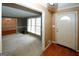 Open-concept living area with new carpeting, large windows, and fresh paint for modern appeal at 2533 Whispering Pines Dr, Grayson, GA 30017