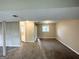 Spacious finished basement with carpet, neutral paint, and lots of space at 2786 Altaview Se Dr, Atlanta, GA 30354