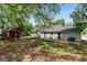 This home features a shed in the backyard, and a small back patio at 4 Bonnie Glen Ln, Hampton, GA 30228