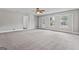 Spacious living room with neutral carpet and walls at 4 Bonnie Glen Ln, Hampton, GA 30228