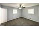 Bright bedroom features two windows, neutral paint, and ceiling fan at 2087 John Wesley Ct, Decatur, GA 30035