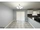 Eat-in kitchen area featuring granite countertops, tile floors, and sliding glass doors for access to the outside at 2087 John Wesley Ct, Decatur, GA 30035