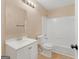 A bathroom with a sink, toilet, and shower and tub combination at 10018 Clearwater Trl, Jonesboro, GA 30238