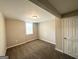 Neutral bedroom with carpet, a window for natural light and closet for storage at 837 Needle Rock Dr, Stone Mountain, GA 30083