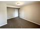 Bedroom with carpet, neutral paint, and ceiling light is waiting for your personal touches at 837 Needle Rock Dr, Stone Mountain, GA 30083