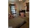 Bedroom featuring carpet floors, a bed, and a window with curtains at 104 14Th St, Cumming, GA 30040