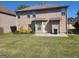 Spacious backyard featuring a well-maintained lawn and a small patio area perfect for outdoor relaxation at 3620 Pickeral St, Fairburn, GA 30213