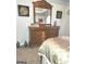 Well-appointed bedroom with a dresser with a large mirror at 3620 Pickeral St, Fairburn, GA 30213