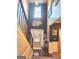 Grand two-story foyer with dark accent wall, stunning decor, and a welcoming entrance at 3620 Pickeral St, Fairburn, GA 30213