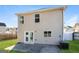 Image of back exterior of the home with patio and lawn at 312 Silver Fox Trl, Dallas, GA 30157
