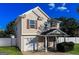 Two-story home features red window shutters, a fenced yard, and an attached garage at 312 Silver Fox Trl, Dallas, GA 30157