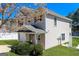 Charming two-story home featuring a well-maintained lawn, manicured bushes, and inviting architecture at 312 Silver Fox Trl, Dallas, GA 30157