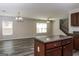 Living room with dining room and kitchen area, new floors, a ceiling fan and lots of natural light at 312 Silver Fox Trl, Dallas, GA 30157