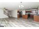 Inviting living room showcases new floors and an open layout connecting to the kitchen and staircase at 312 Silver Fox Trl, Dallas, GA 30157