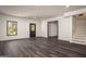 Spacious basement with vinyl flooring, natural light, and access to outdoors at 50 Clear Spring Ct, Oxford, GA 30054