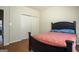 Bedroom featuring a closet, light walls, and neutral-colored carpeting at 50 Clear Spring Ct, Oxford, GA 30054