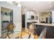 Eat-in kitchen featuring a round table, stainless steel appliances and an island counter at 50 Clear Spring Ct, Oxford, GA 30054