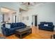 Open living room with high ceilings, hardwood floors, and an abundance of natural light, perfect for entertaining at 50 Clear Spring Ct, Oxford, GA 30054