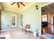 Relaxing screened porch with outdoor seating and access to backyard at 50 Clear Spring Ct, Oxford, GA 30054