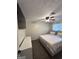 Comfortable bedroom features a ceiling fan, plush carpet and a serene atmosphere at 2900 Haddon Dr, Rex, GA 30273
