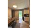 Cozy dining area featuring a wooden table with seating, and a sliding glass door to the backyard at 2900 Haddon Dr, Rex, GA 30273