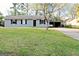 Charming single-story home with a well-maintained lawn and inviting curb appeal at 2900 Haddon Dr, Rex, GA 30273
