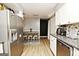 Eat-in kitchen features stainless steel appliances and a charming breakfast nook at 2900 Haddon Dr, Rex, GA 30273