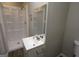 Updated bathroom with vanity and walk-in shower at 5960 John St, Austell, GA 30106