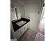 Bathroom featuring a white sink, tile floor, and vanity at 2760 The Fontainebleau Sw, Atlanta, GA 30331
