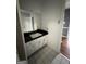 Bathroom featuring a white sink, tile floor, and vanity at 2760 The Fontainebleau Sw, Atlanta, GA 30331