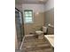 Bathroom with updated shower, toilet, vanity, and tiling at 2760 The Fontainebleau Sw, Atlanta, GA 30331