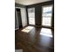 Bedroom featuring hardwood floors, freshly painted walls, and natural light from windows at 2760 The Fontainebleau Sw, Atlanta, GA 30331