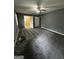 Spacious bedroom with gray carpet and walls, featuring a ceiling fan at 2760 The Fontainebleau Sw, Atlanta, GA 30331