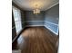 Classic dining room featuring hardwood floors and an elegant chandelier at 2760 The Fontainebleau Sw, Atlanta, GA 30331