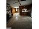 Inviting living room with a brick fireplace, wood paneling, and tile flooring at 2760 The Fontainebleau Sw, Atlanta, GA 30331