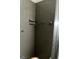 Tiled shower stall with chrome fixtures and soap dish at 2760 The Fontainebleau Sw, Atlanta, GA 30331