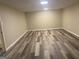 Spacious basement area featuring vinyl flooring and neutral paint, perfect for customization at 2502 Miriam Ln, Decatur, GA 30032