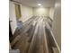 Spacious basement featuring updated gray vinyl flooring and neutral walls offering a versatile living area at 2502 Miriam Ln, Decatur, GA 30032