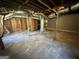 Unfinished basement featuring concrete floors, exposed ductwork, and unfinished walls ready to be renovated at 2502 Miriam Ln, Decatur, GA 30032