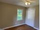 This bedroom offers natural light from the window and has a closet, creating a serene and functional space at 2502 Miriam Ln, Decatur, GA 30032