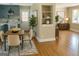 Inviting dining area adjacent to the kitchen, with a wooden table and contemporary chairs at 2502 Miriam Ln, Decatur, GA 30032