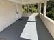 Covered porch with concrete flooring offers a welcoming entry and outdoor relaxation space at 2502 Miriam Ln, Decatur, GA 30032