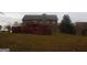 Exterior view of the home showcasing the backyard and deck at 1742 Pine Fort Cir, Dacula, GA 30019